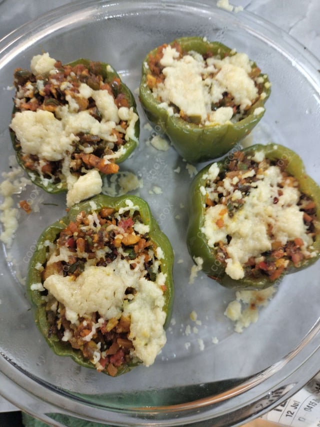 Delicious Bharwa Shimla Mirch prepared by COOX