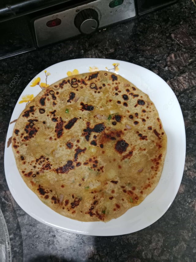 Delicious Stuffed Paranthas prepared by COOX