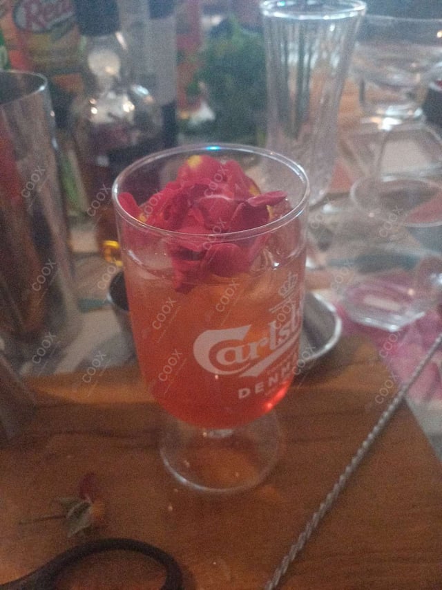 Delicious Rose Wine Cocktail prepared by COOX