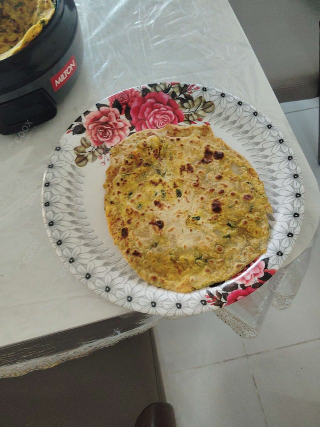Delicious Stuffed Paranthas prepared by COOX