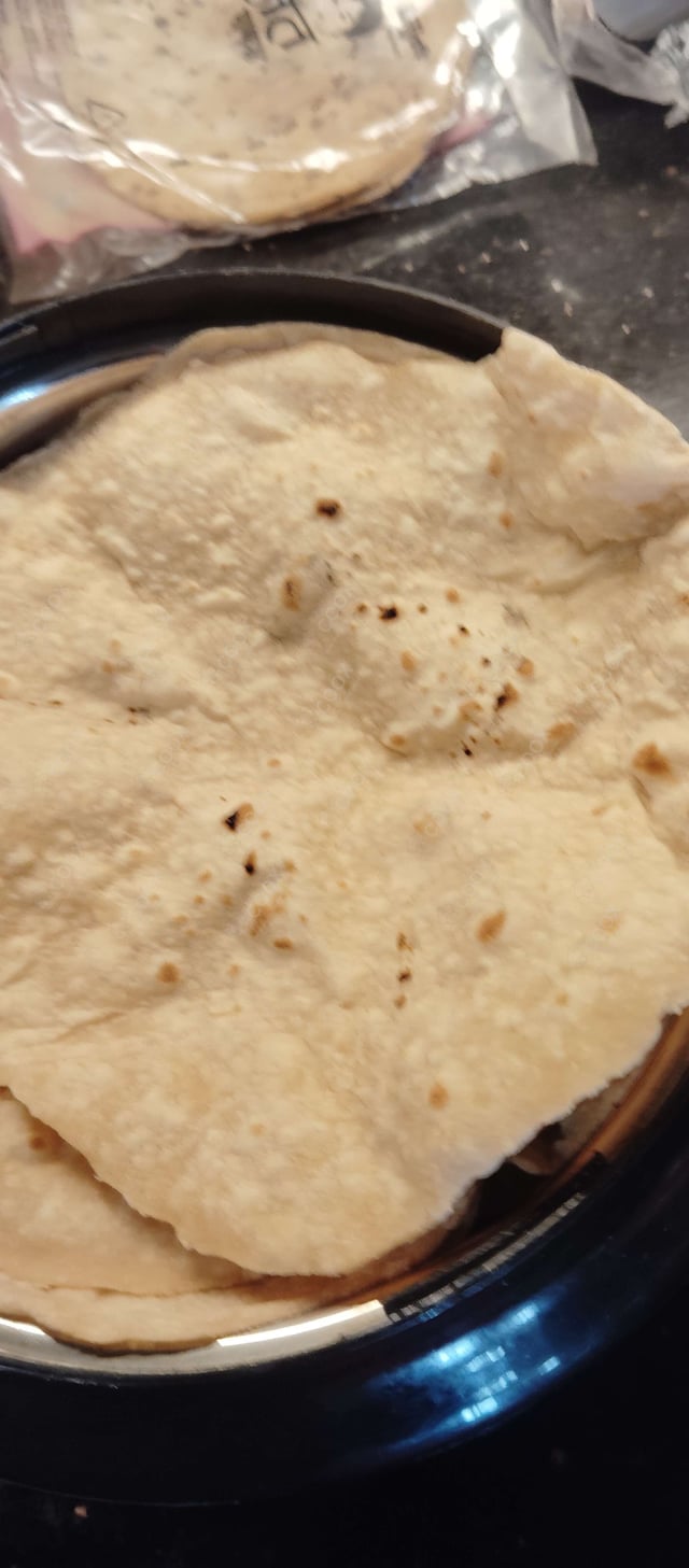 Delicious Tawa Rotis prepared by COOX