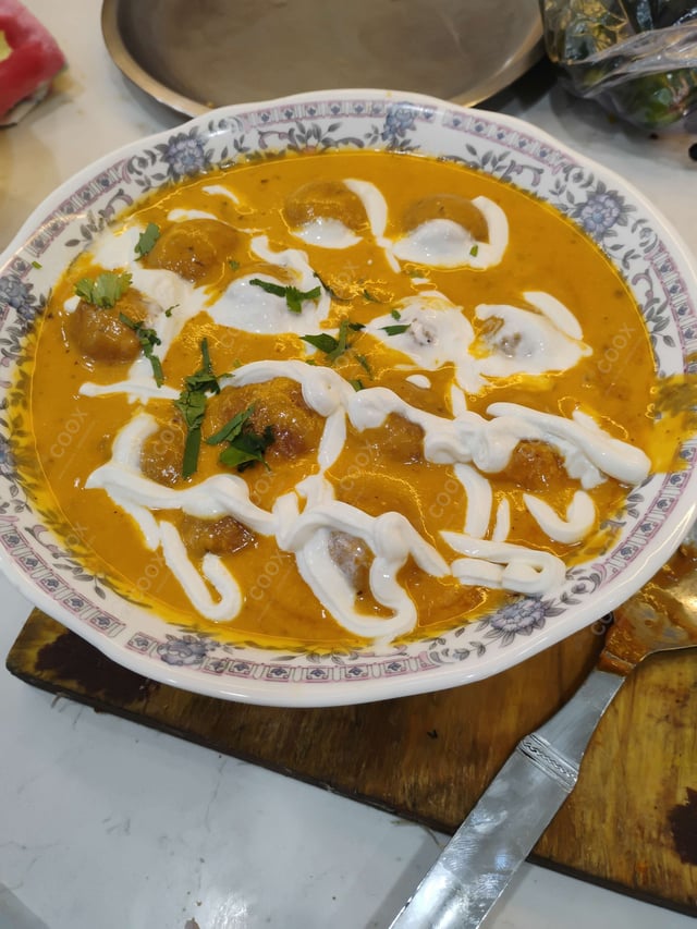 Delicious Malai Kofta (White Gravy) prepared by COOX