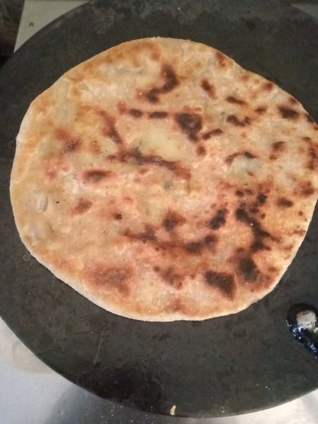 Delicious Stuffed Paranthas prepared by COOX