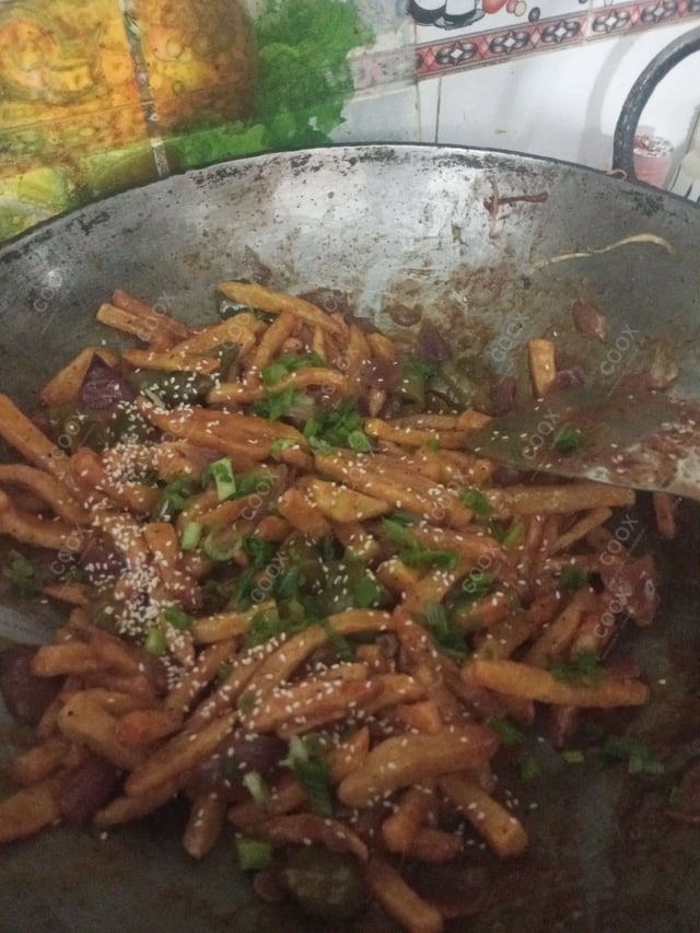 Delicious Honey Chilli Potato prepared by COOX
