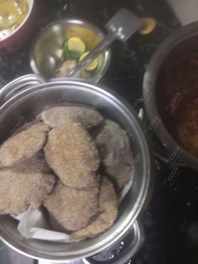 Delicious Kuttu ki Pooris prepared by COOX