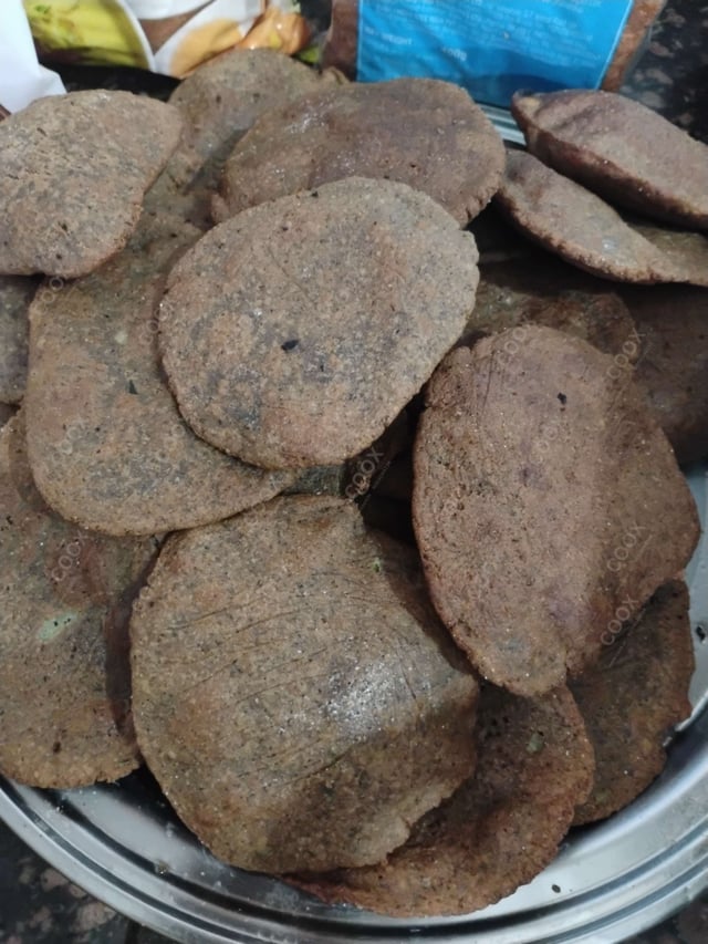 Delicious Kuttu ki Pooris prepared by COOX
