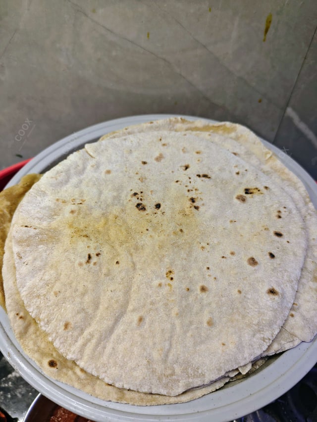 Delicious Tawa Rotis prepared by COOX