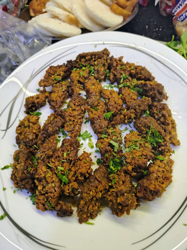 Delicious Mutton Seekh Kebab prepared by COOX