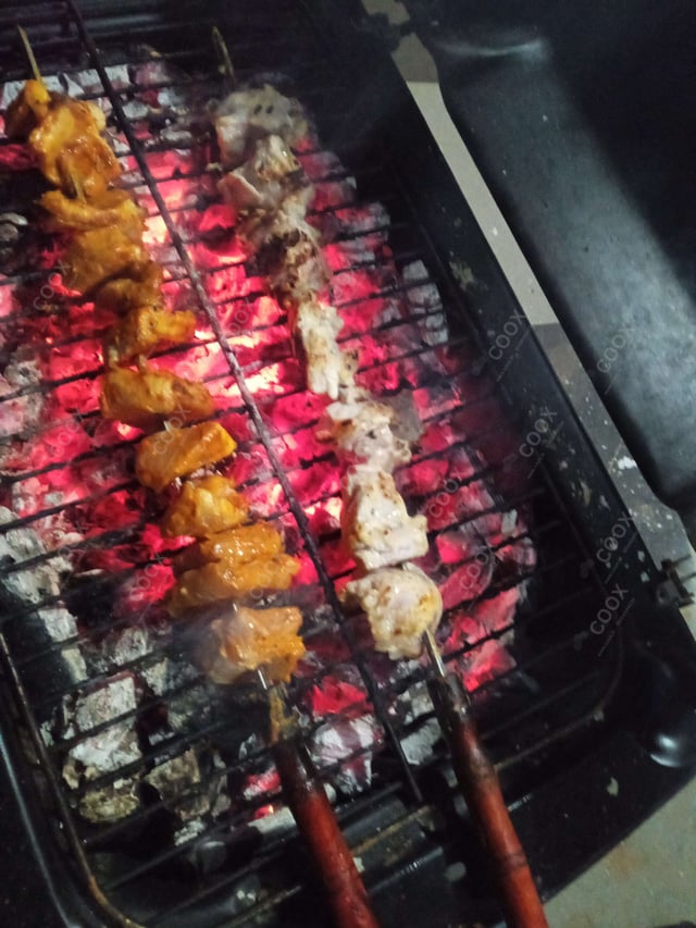 Delicious Murgh Malai Tikka prepared by COOX