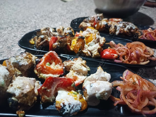 Delicious Murgh Malai Tikka prepared by COOX