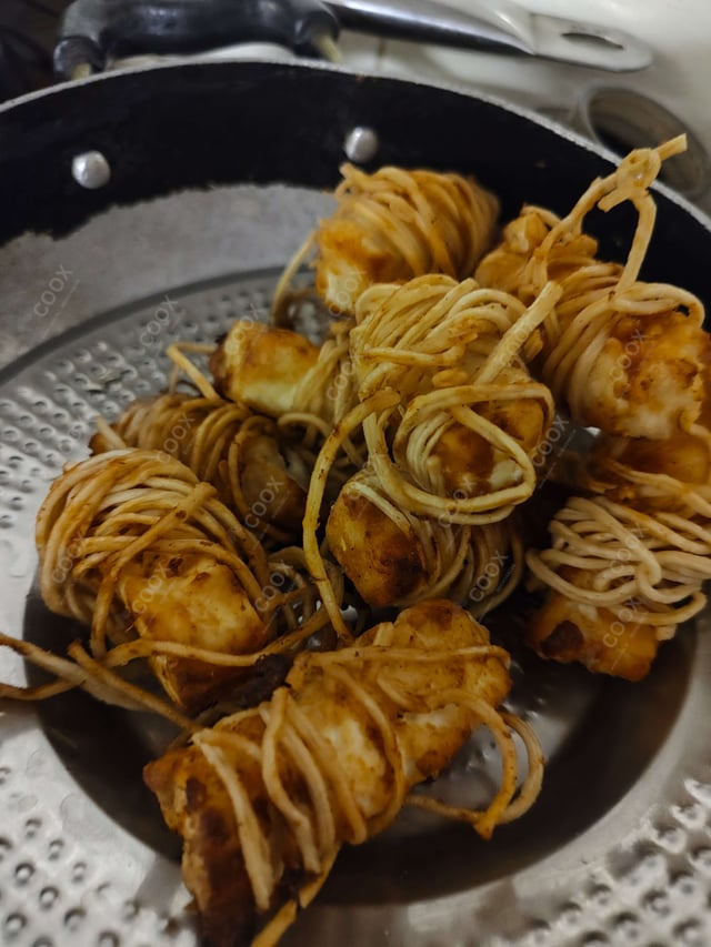 Delicious Threaded Paneer  prepared by COOX