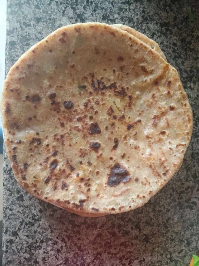 Delicious Stuffed Paranthas prepared by COOX