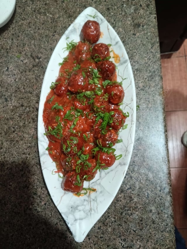 Delicious Veg Manchurian (Dry) prepared by COOX