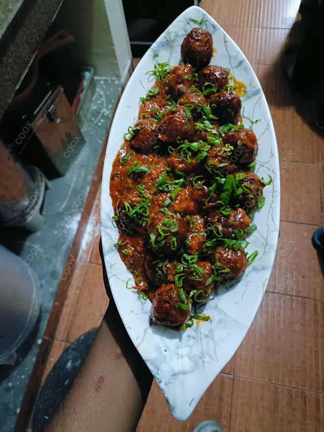 Delicious Veg Manchurian (Gravy) prepared by COOX