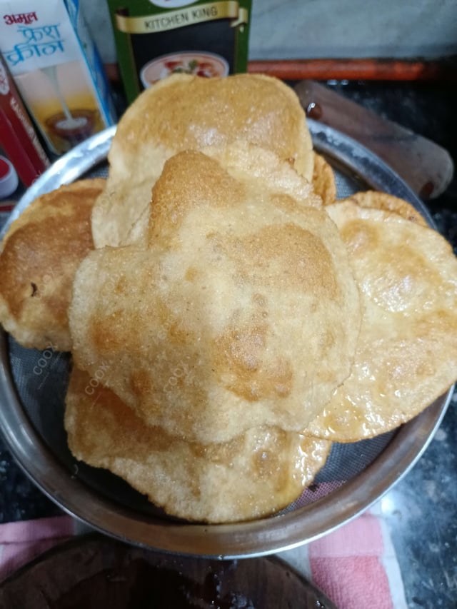 Delicious Pooris & Bedmis prepared by COOX