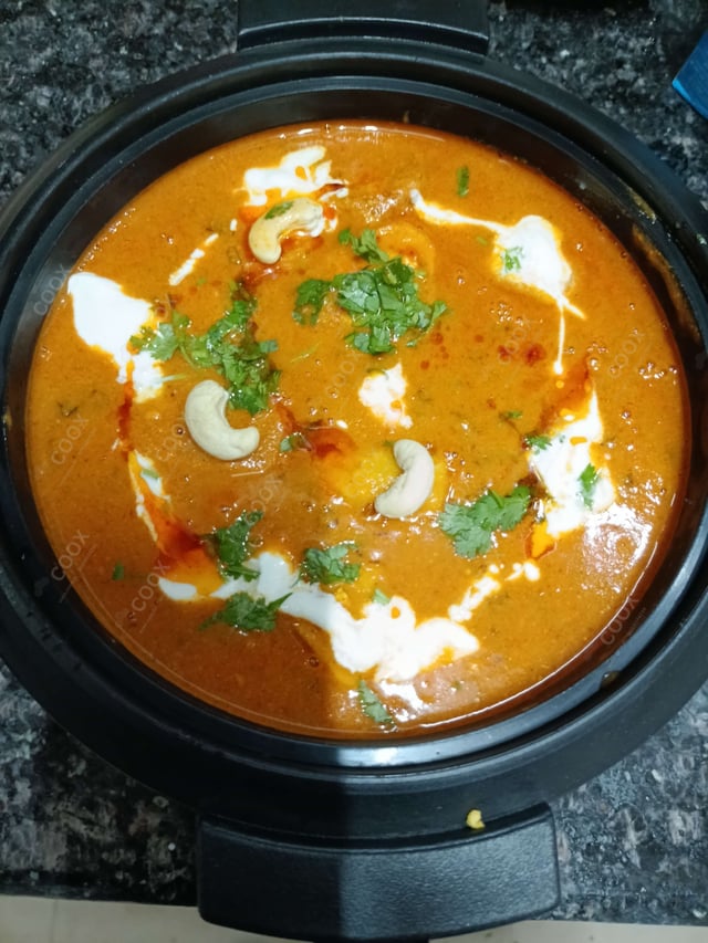 Delicious Dum Aloo prepared by COOX