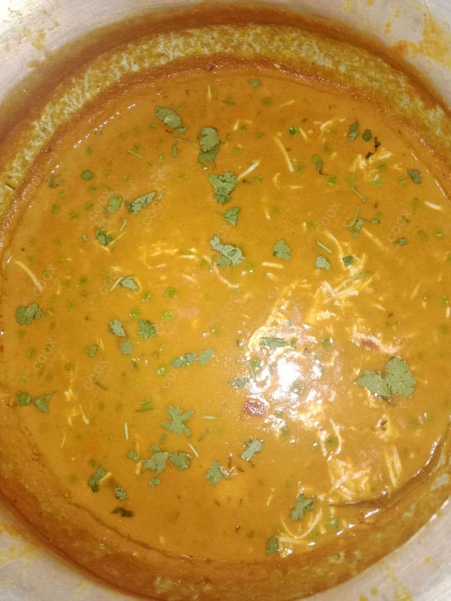 Delicious Matar Paneer prepared by COOX