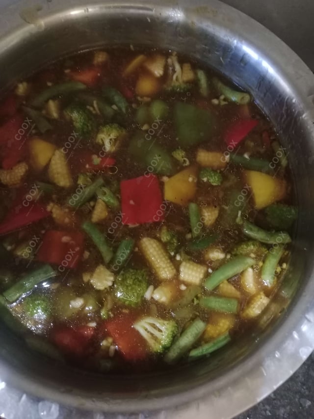 Delicious Mix Veg in Hot Garlic Sauce prepared by COOX