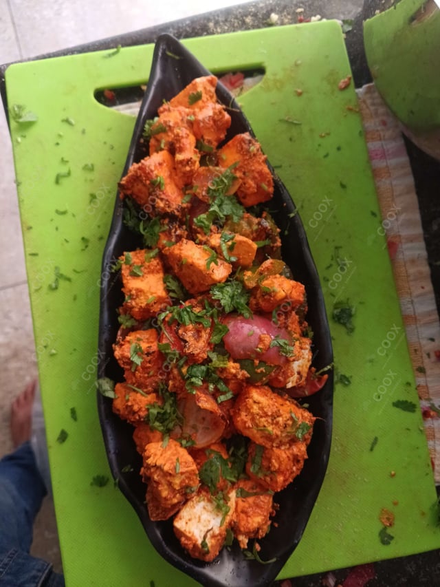 Delicious Paneer Tikka prepared by COOX