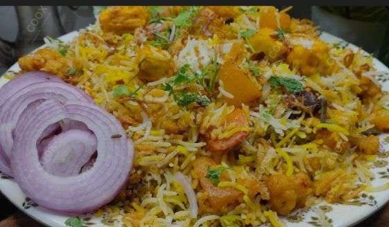 Delicious Veg Biryani prepared by COOX