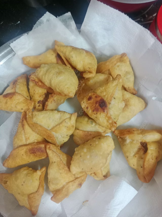 Delicious Mini Samosas prepared by COOX