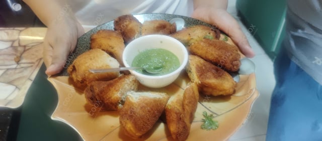 Delicious Dahi ke Sholey prepared by COOX
