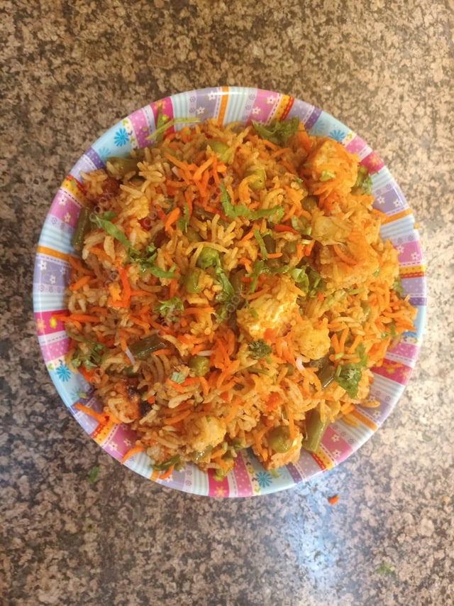 Delicious Veg Biryani prepared by COOX