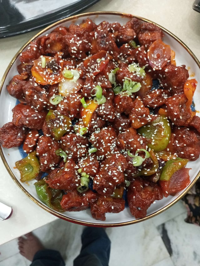 Delicious Chilli Chicken prepared by COOX