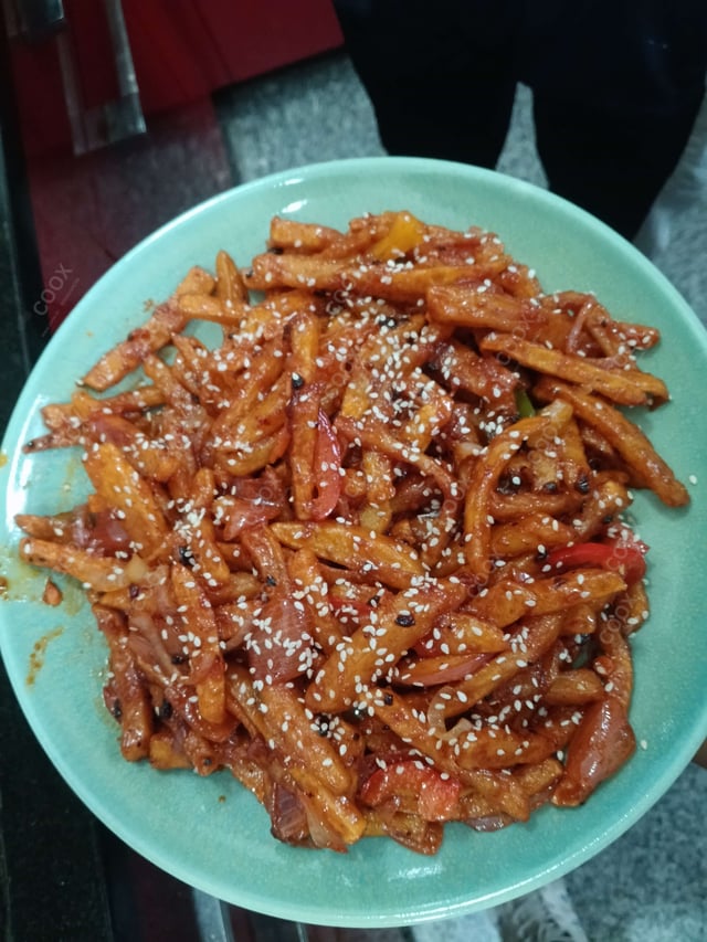 Delicious Honey Chilli Potato prepared by COOX