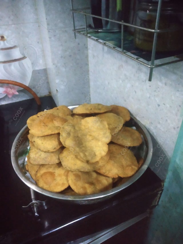 Delicious Pooris & Bedmis prepared by COOX