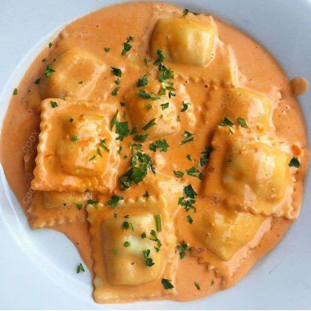 Delicious Ravioli in Pink Sauce prepared by COOX