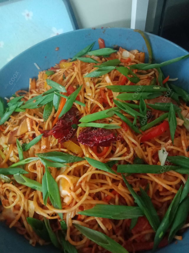 Delicious Chicken Chilli Garlic Noodles prepared by COOX