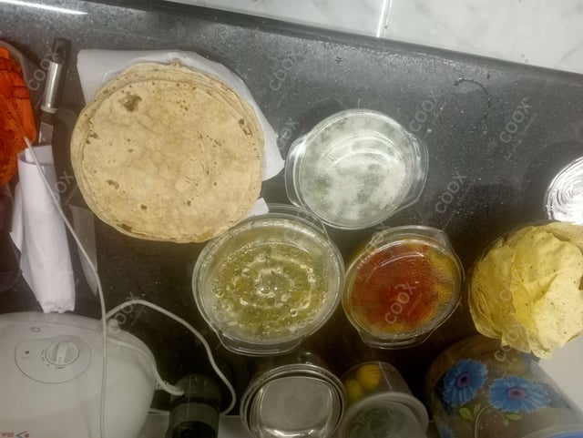 Delicious Tawa Rotis prepared by COOX