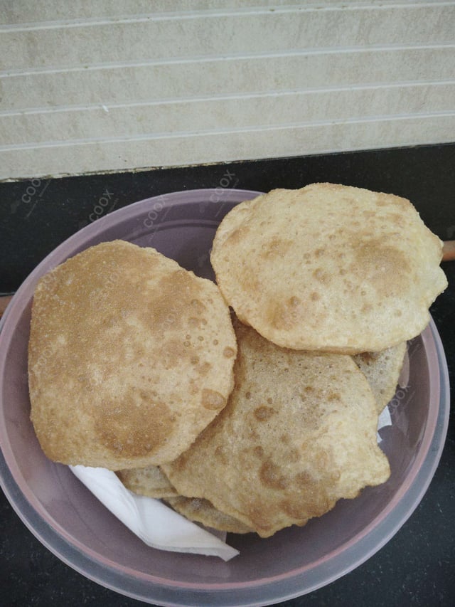Delicious Pooris & Bedmis prepared by COOX