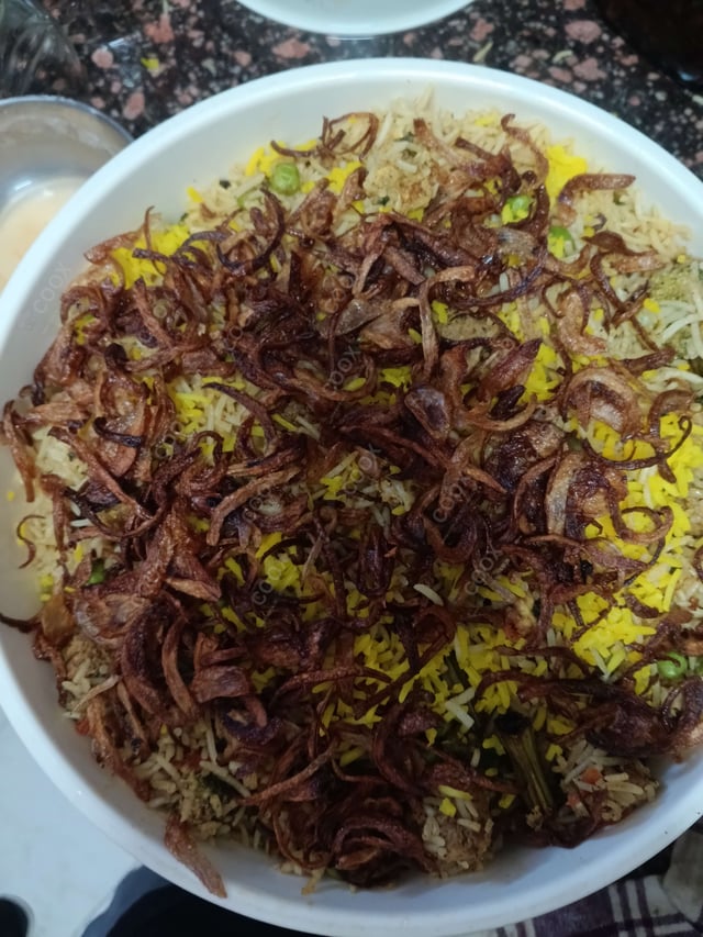 Delicious Veg Biryani prepared by COOX