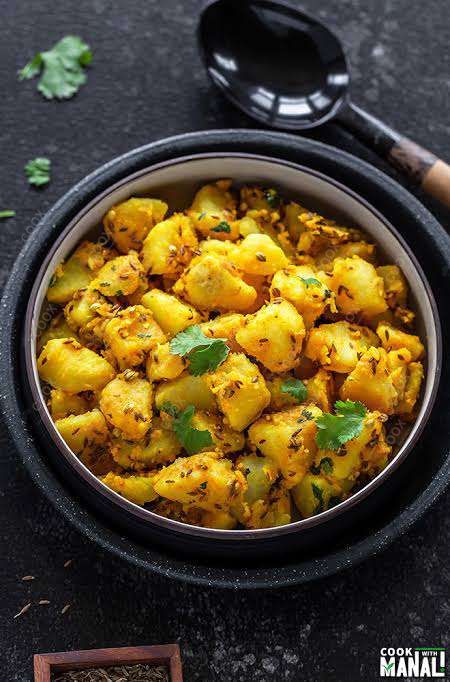 Delicious Jeera Aloo prepared by COOX