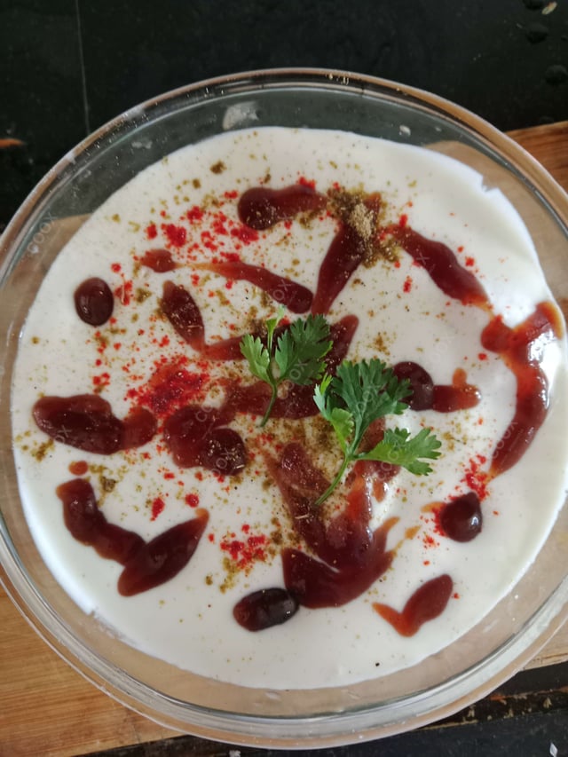 Delicious Dahi Bhalla prepared by COOX