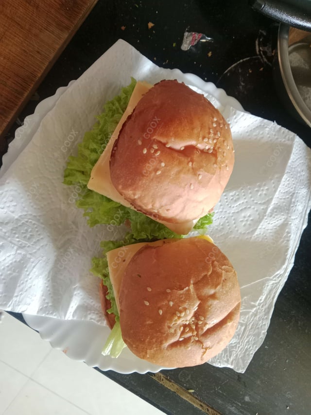 Delicious Mini Veg Burgers prepared by COOX