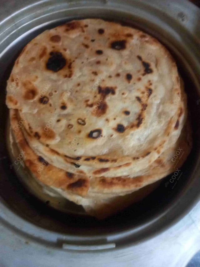 Delicious Stuffed Paranthas prepared by COOX