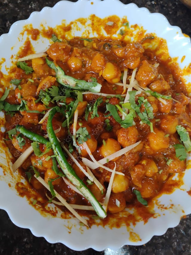 Delicious Chana Bhatura prepared by COOX