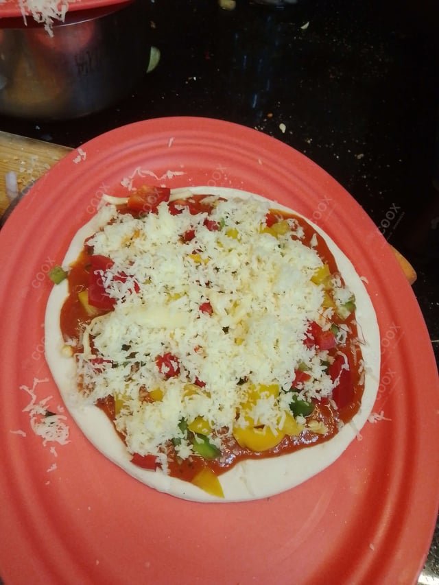Delicious Veg Pizza prepared by COOX