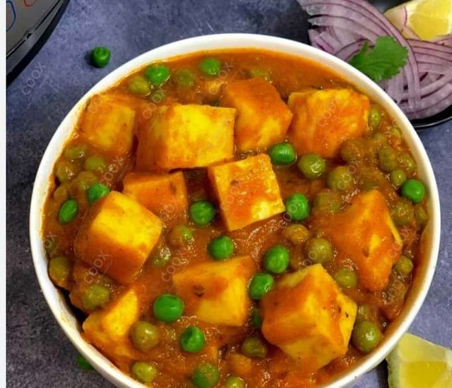 Delicious Matar Paneer prepared by COOX