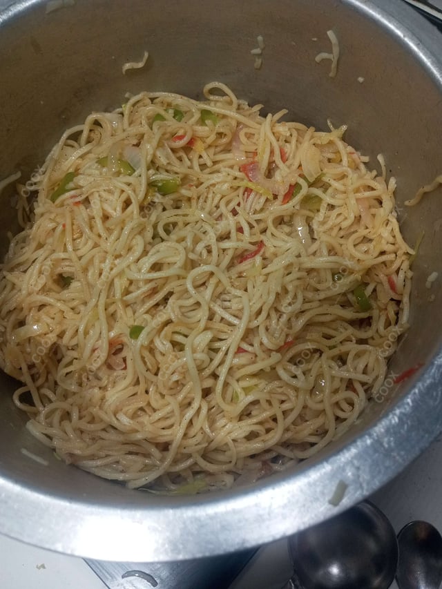 Delicious Veg Hakka Noodles prepared by COOX