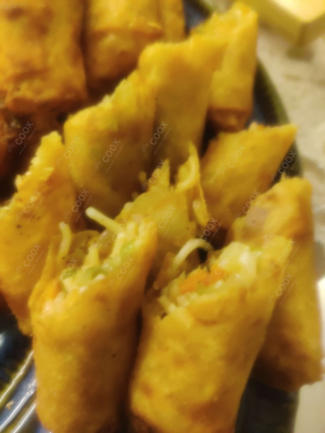 Delicious Veg Spring Rolls prepared by COOX