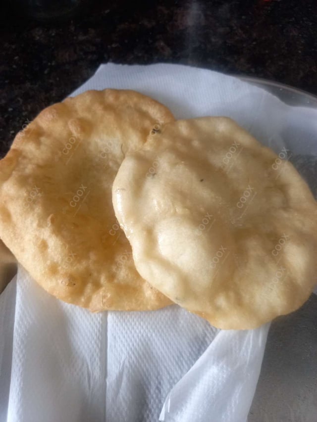 Delicious Bhature prepared by COOX