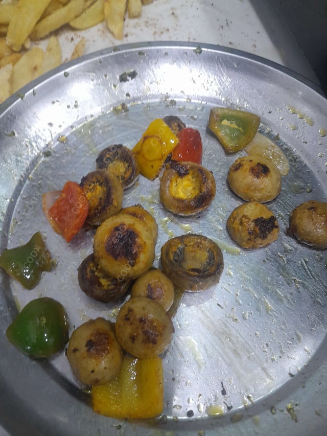 Delicious Mushroom Tikka prepared by COOX