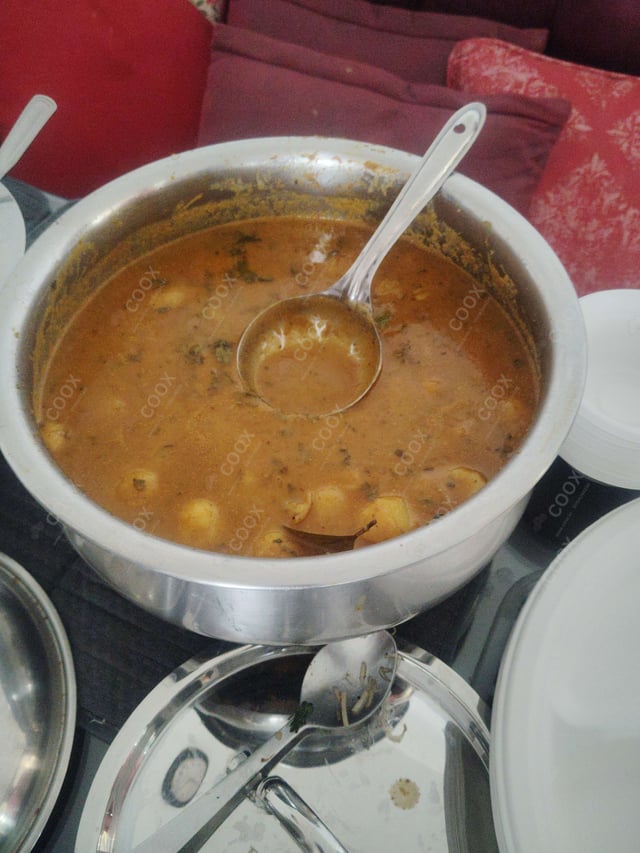 Delicious Dum Aloo prepared by COOX