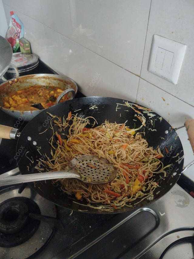 Delicious Veg Hakka Noodles prepared by COOX