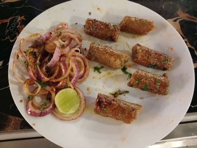 Delicious Chicken Seekh Kebab prepared by COOX