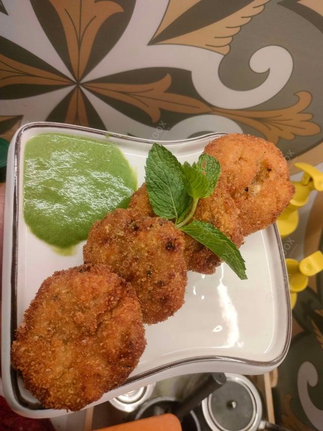 Delicious Dahi ke Sholey prepared by COOX